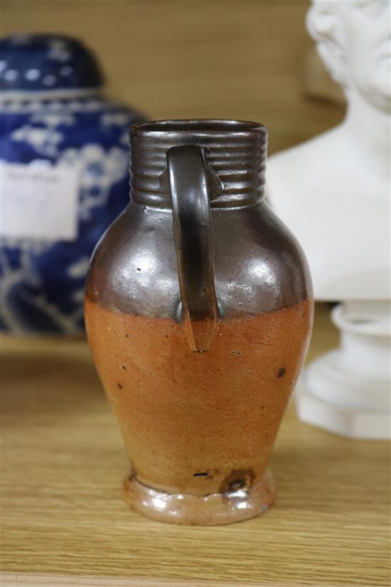 A GI stoneware jug, a Doulton jug and two others 8cm - 22cm